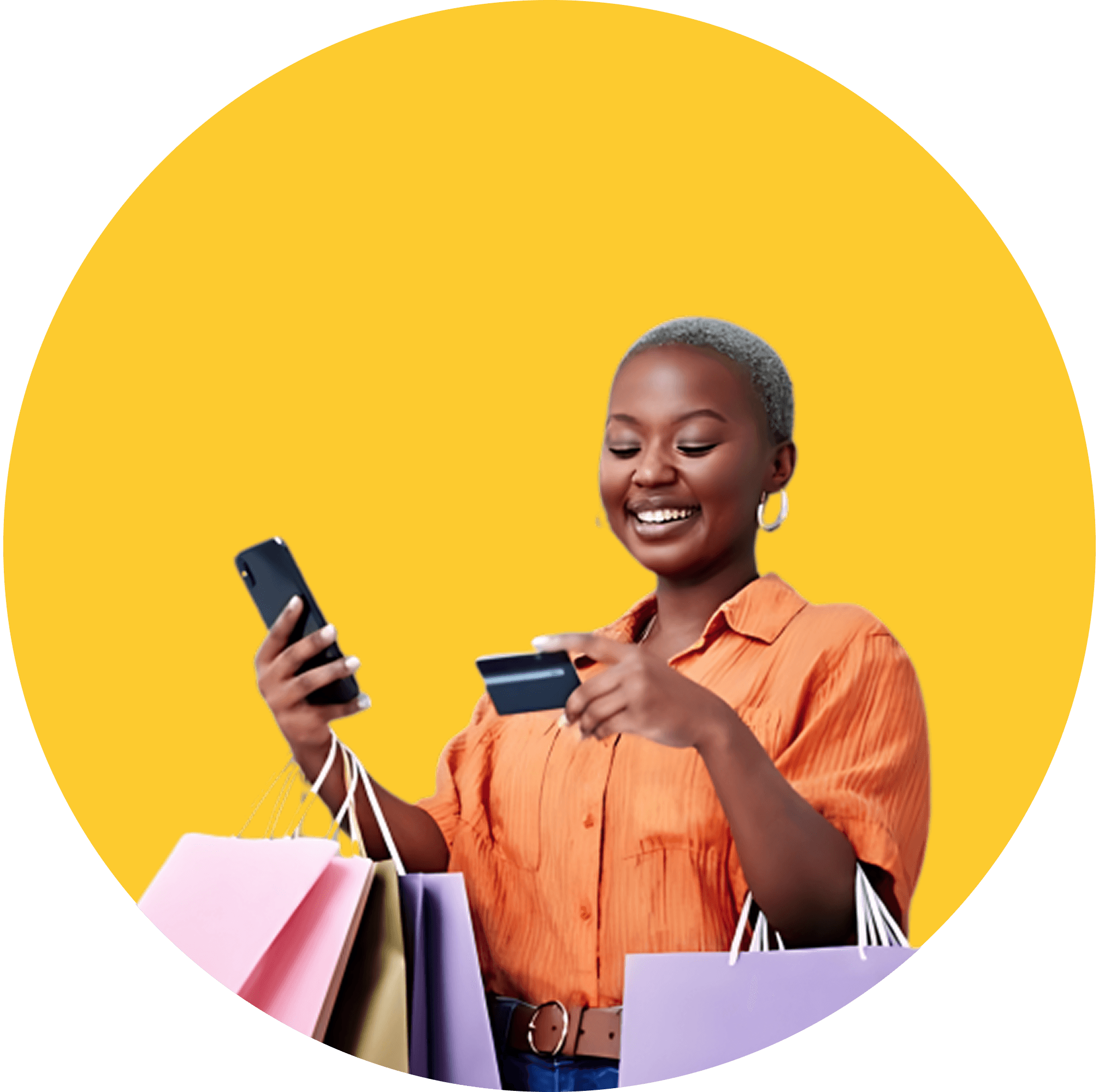 Woman in yellow sweater with shopping bags